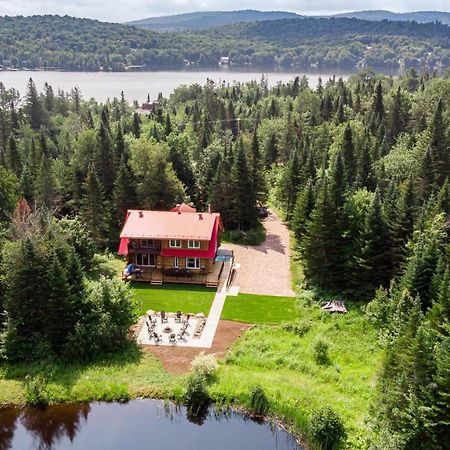 Les Chalets Tourisma - Chalet En Bois Rond Avec Spa Et Lac Prive - Le Caribou Sainte-Catherine Exterior photo