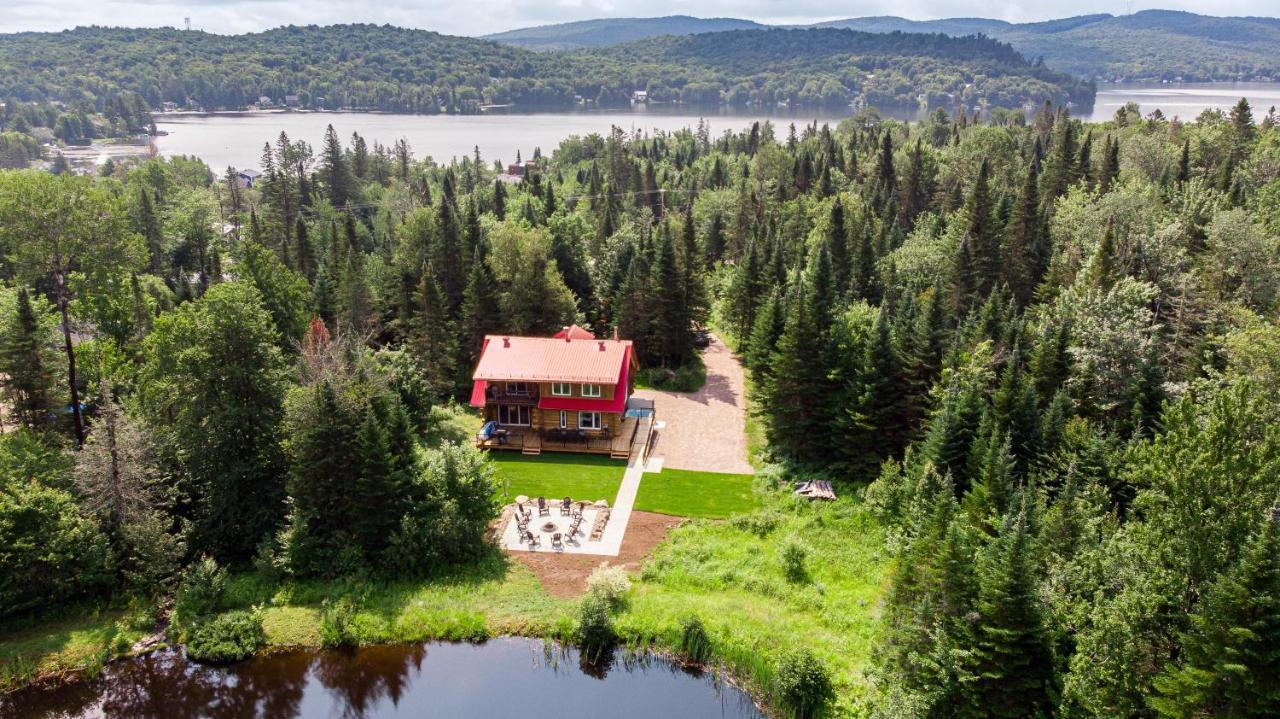 Les Chalets Tourisma - Chalet En Bois Rond Avec Spa Et Lac Prive - Le Caribou Sainte-Catherine Exterior photo